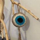 Πλεκτό γούρι μάτι με φούντα γαλάζιο